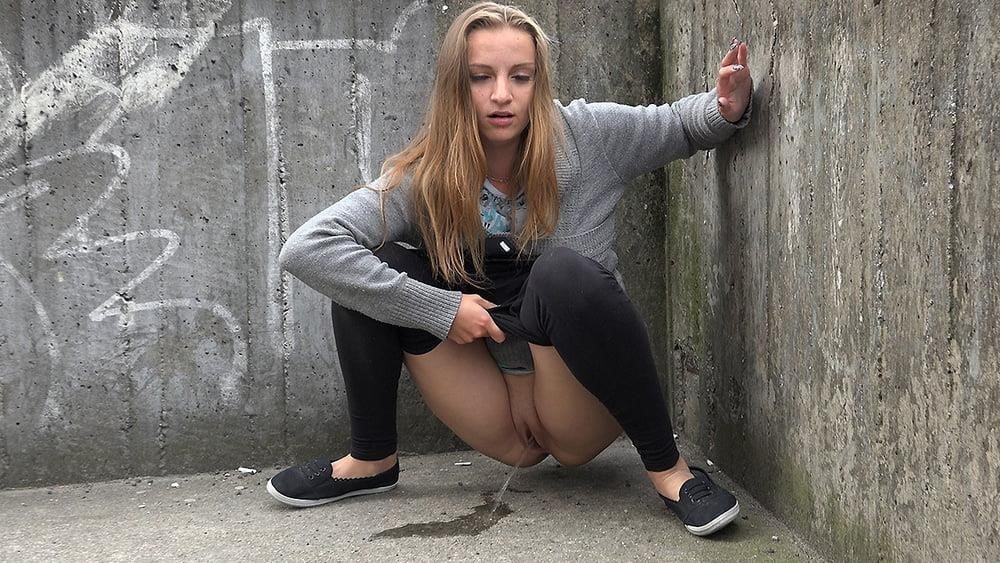 Teen girl peeing in public-4943